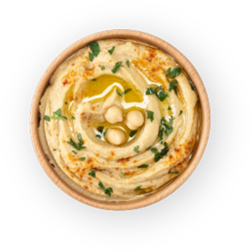 caros__0000_chickpea-hummus-wooden-bowl-garnished-with-parsley-paprika-olive-oil-isolated-white-background-close-up